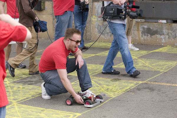 an image of a man kneeling on the ground