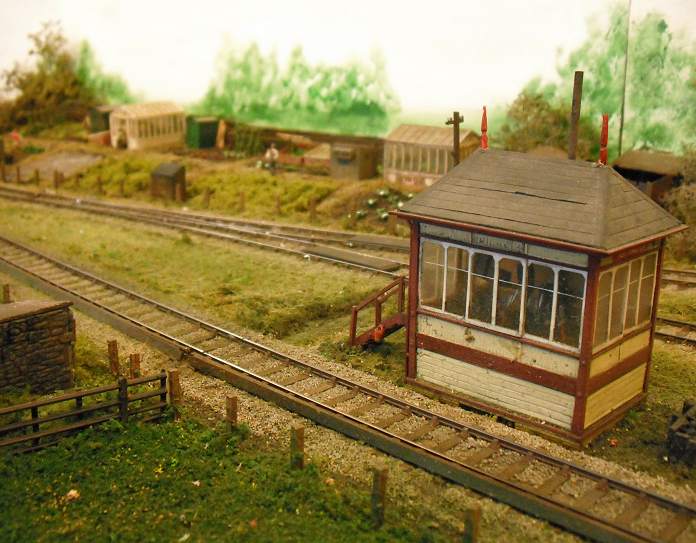 small train station with a small set of tracks