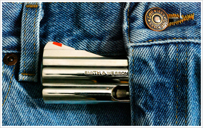 a blue jean with a metal lighter attached to it