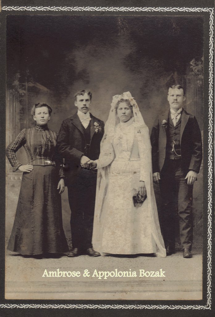 an old time po shows the bride and groom and four other people
