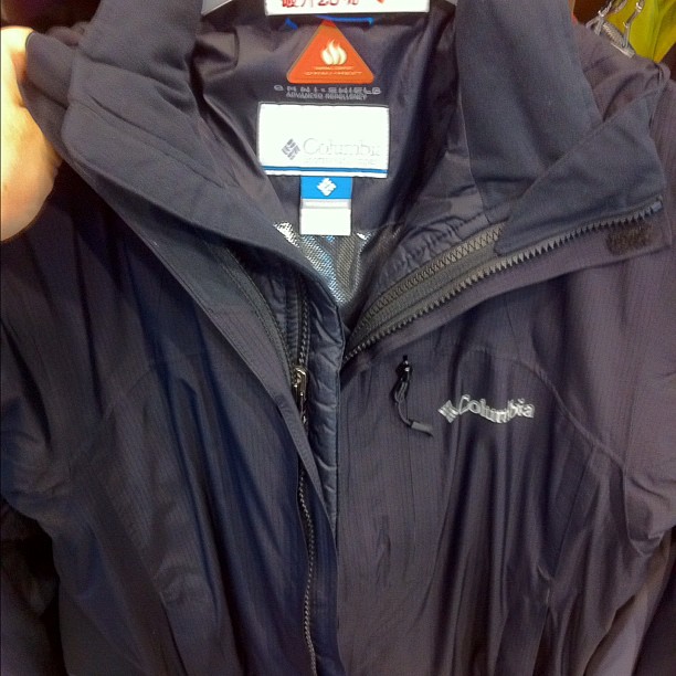 a large jacket on display with the tag saying