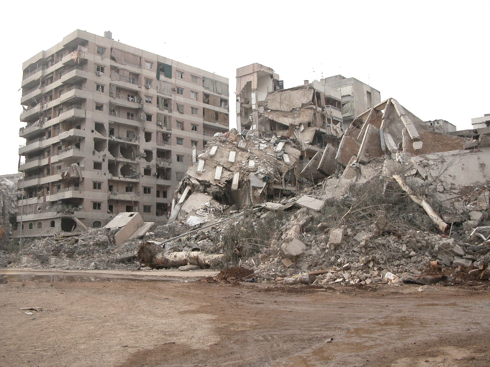buildings and rubble, including several skyscrs