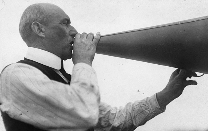 an old po of a man with a megaphone