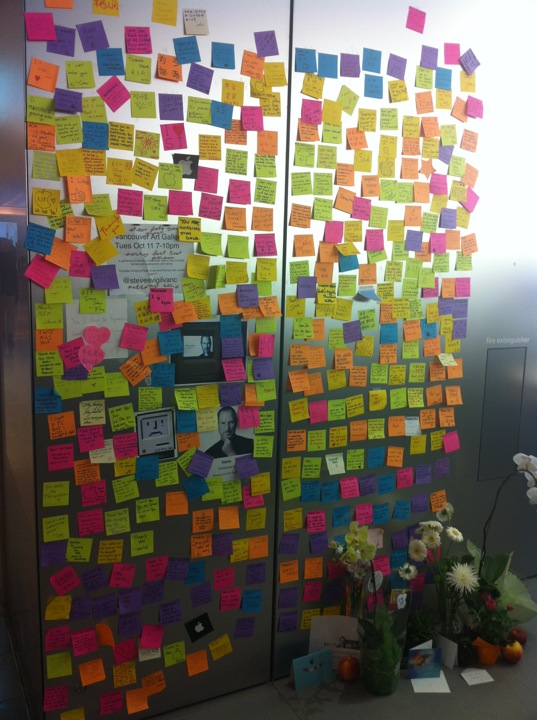 a room with colorful post its and flowers