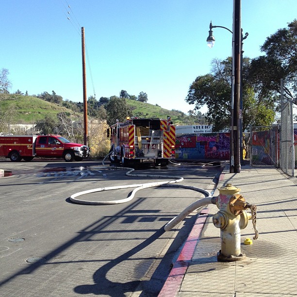 an image of a fire hydrant next to the road