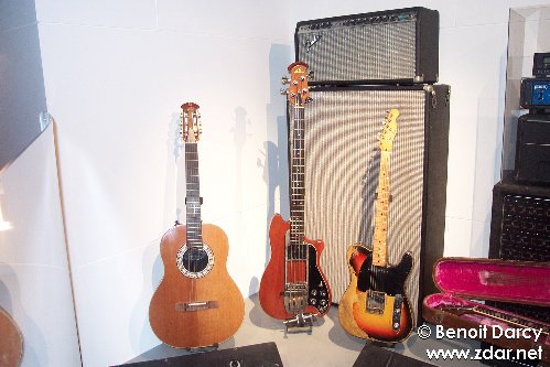 a couple of guitars and some books on display