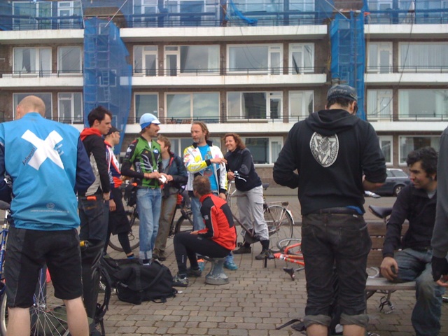 many people in the back ground with bikes