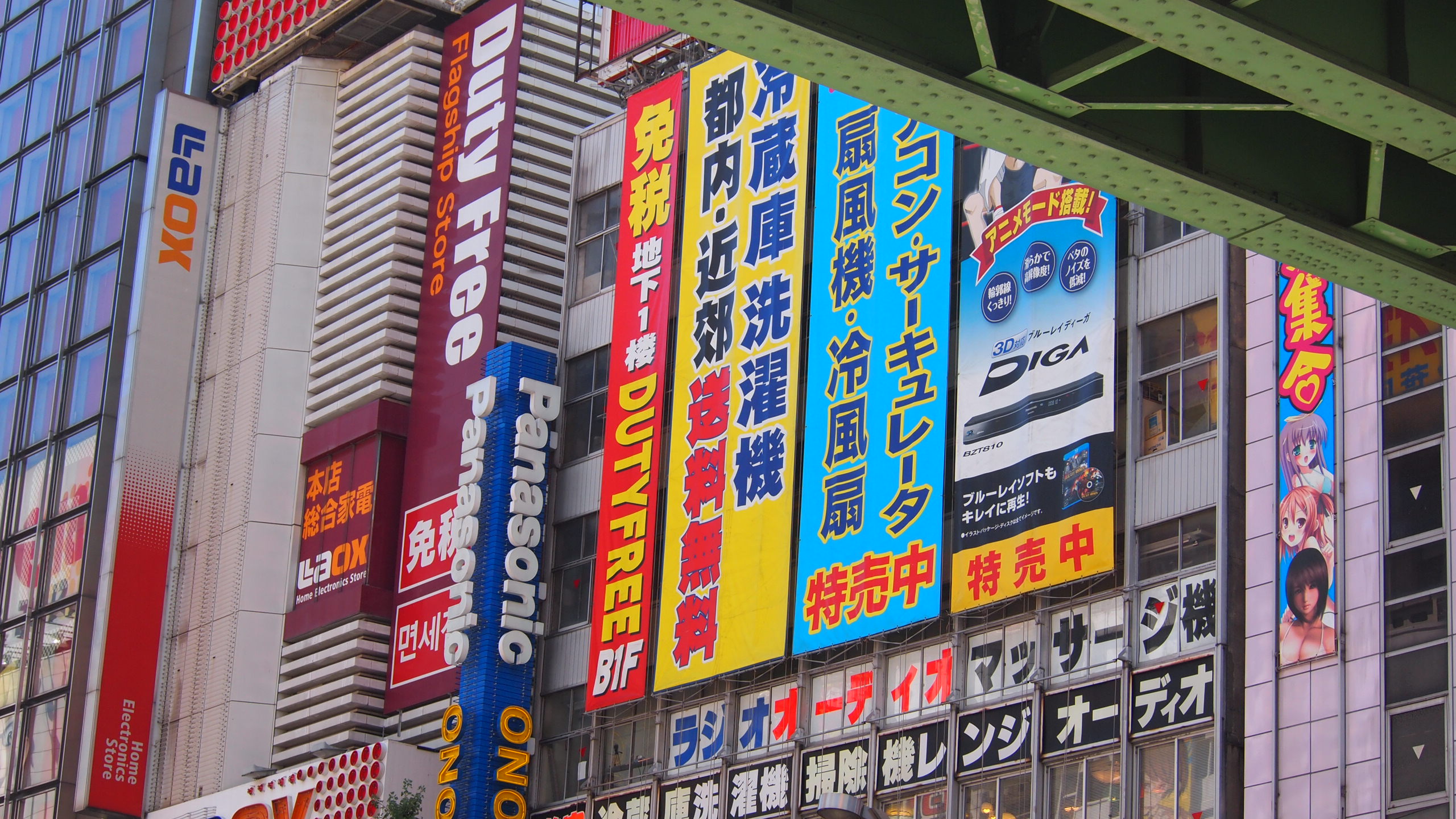 a city filled with tall buildings and signs