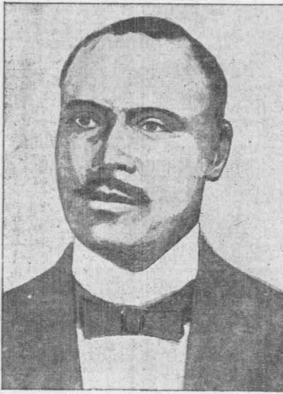 a newspaper clipping shows an old po of a man wearing a suit and tie