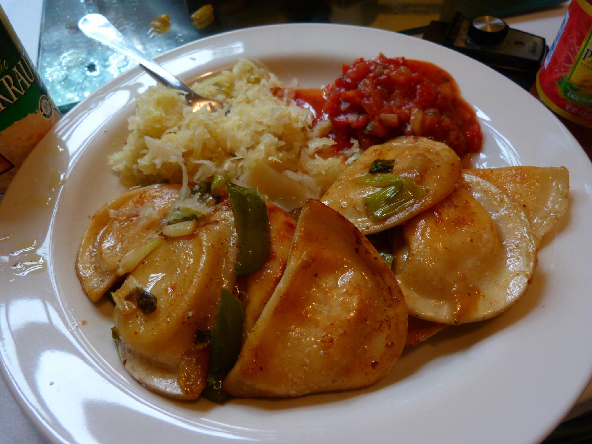 some food is on a white plate and is on a table