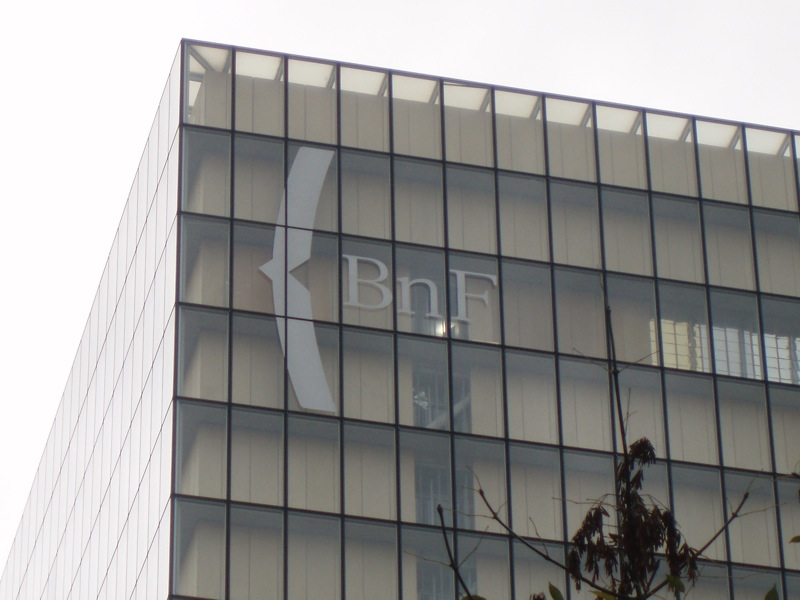 a glass building with the blf logo painted on it