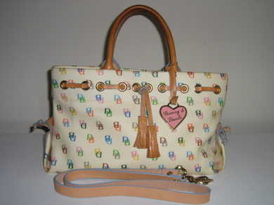 a small purse has a heart on it