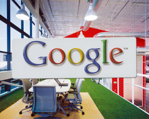 the logo of google hangs in a modern office