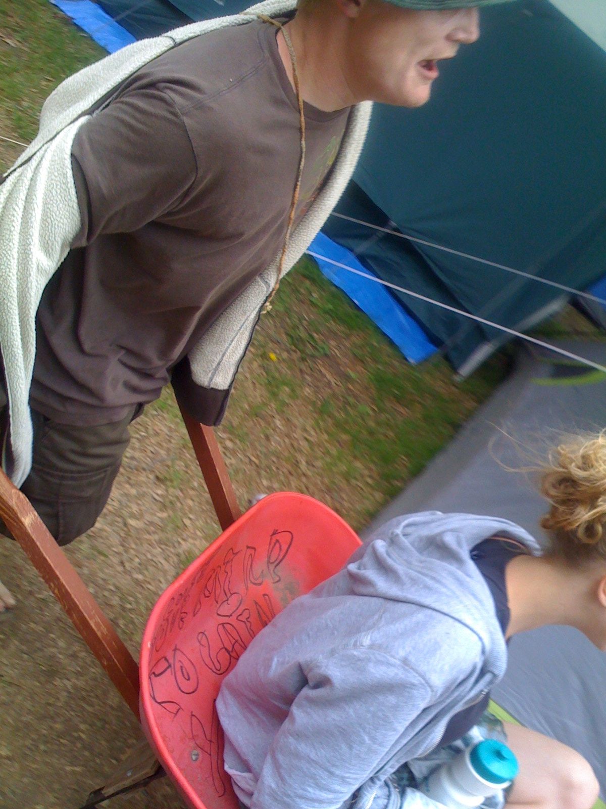 a young child sitting on top of a chair