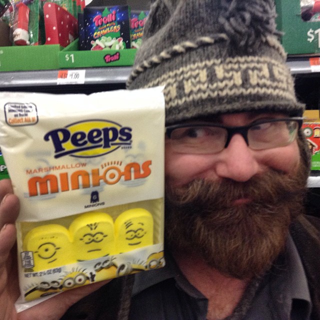 a man holds up a bag of peeps cheese