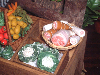 several foods sit in baskets on the floor