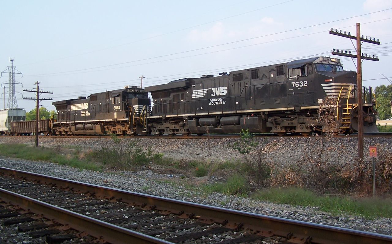 a train that is sitting on the rail road tracks