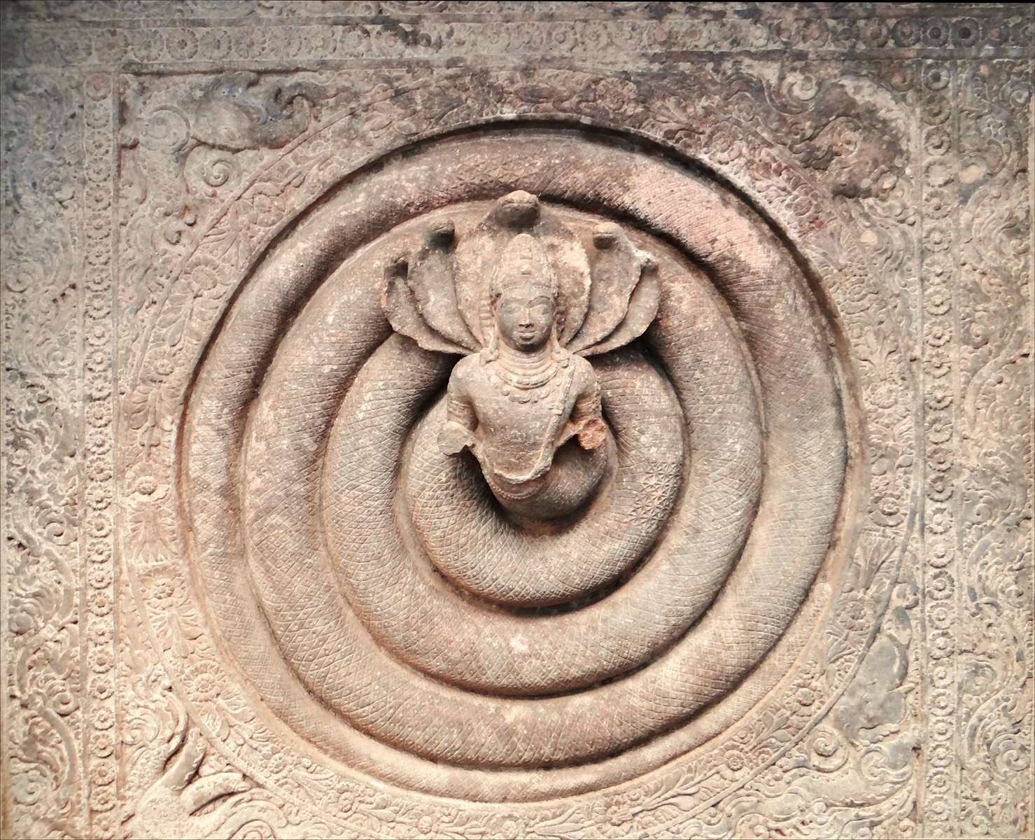 a close up of a stone statue with elephants head