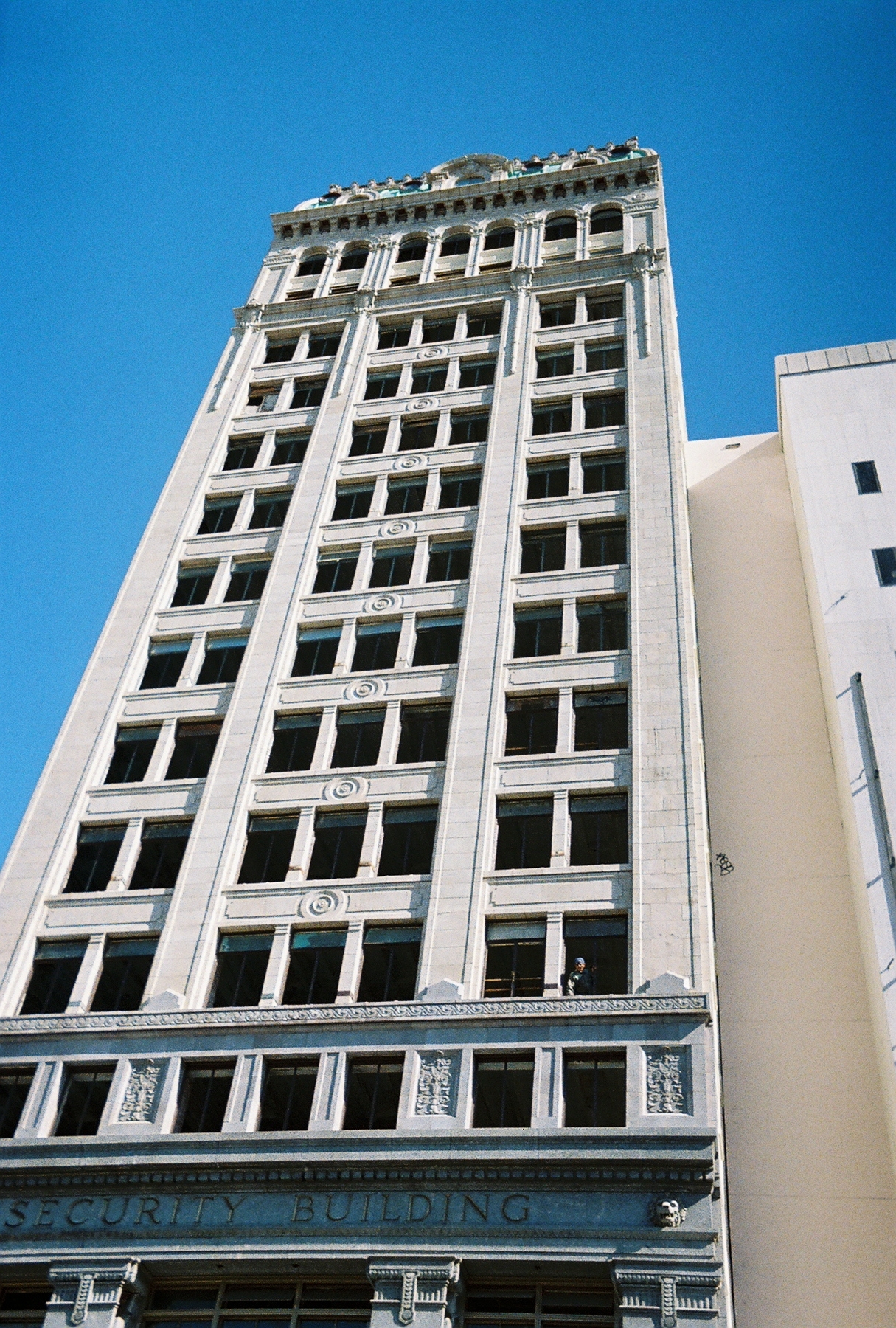 a view of the top of a building from below