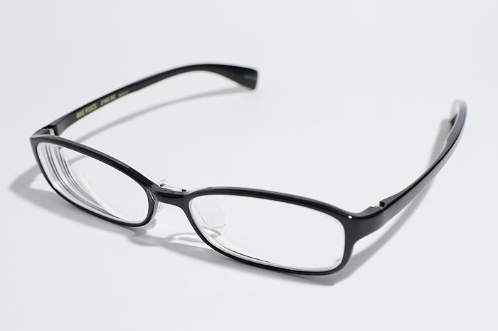 black plastic eyeglasses on a white background