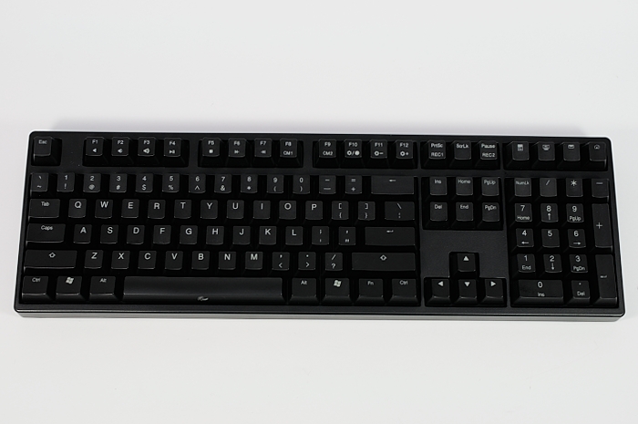 a computer keyboard has black keys and has no numbers