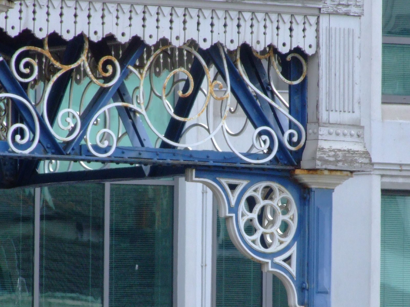 the iron and glass details are in an architectural style