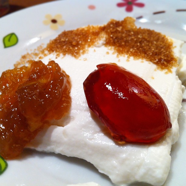 two desserts are shown, one with jelly on top