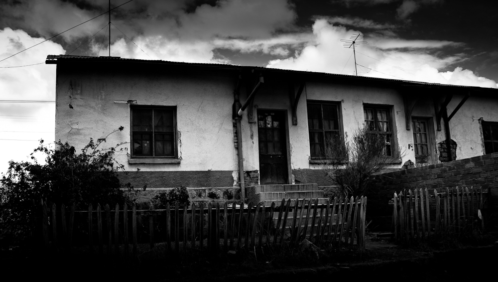 a black and white image of a house