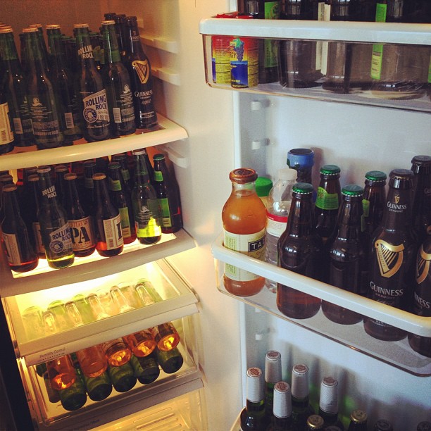 a refrigerator filled with lots of cold beverages