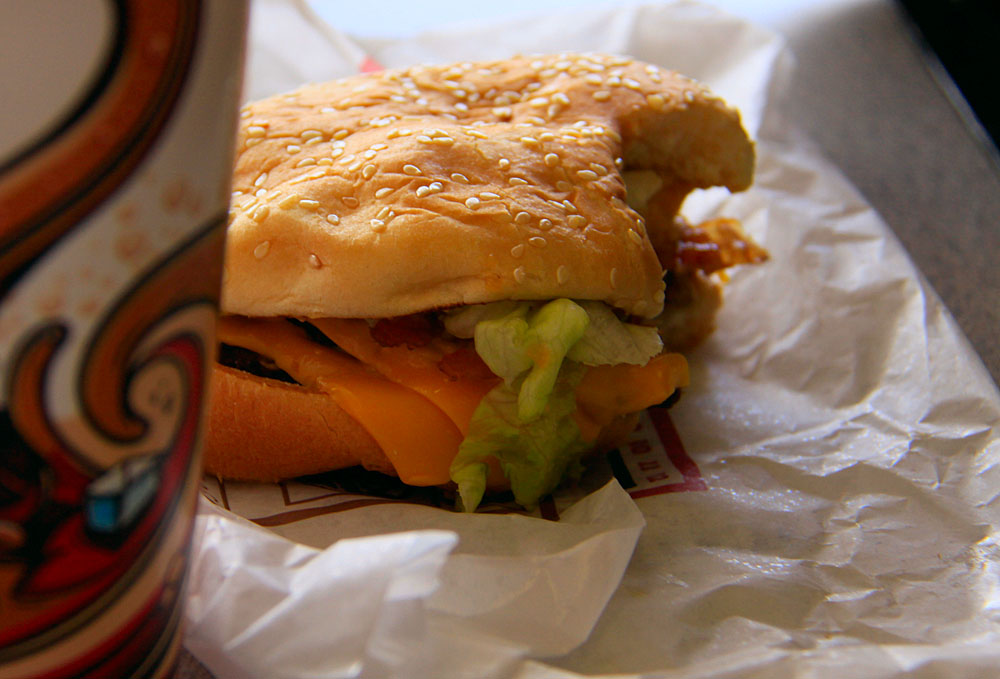 a close up of a sandwich on a piece of paper