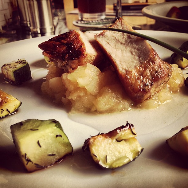 an assortment of food is arranged on a plate