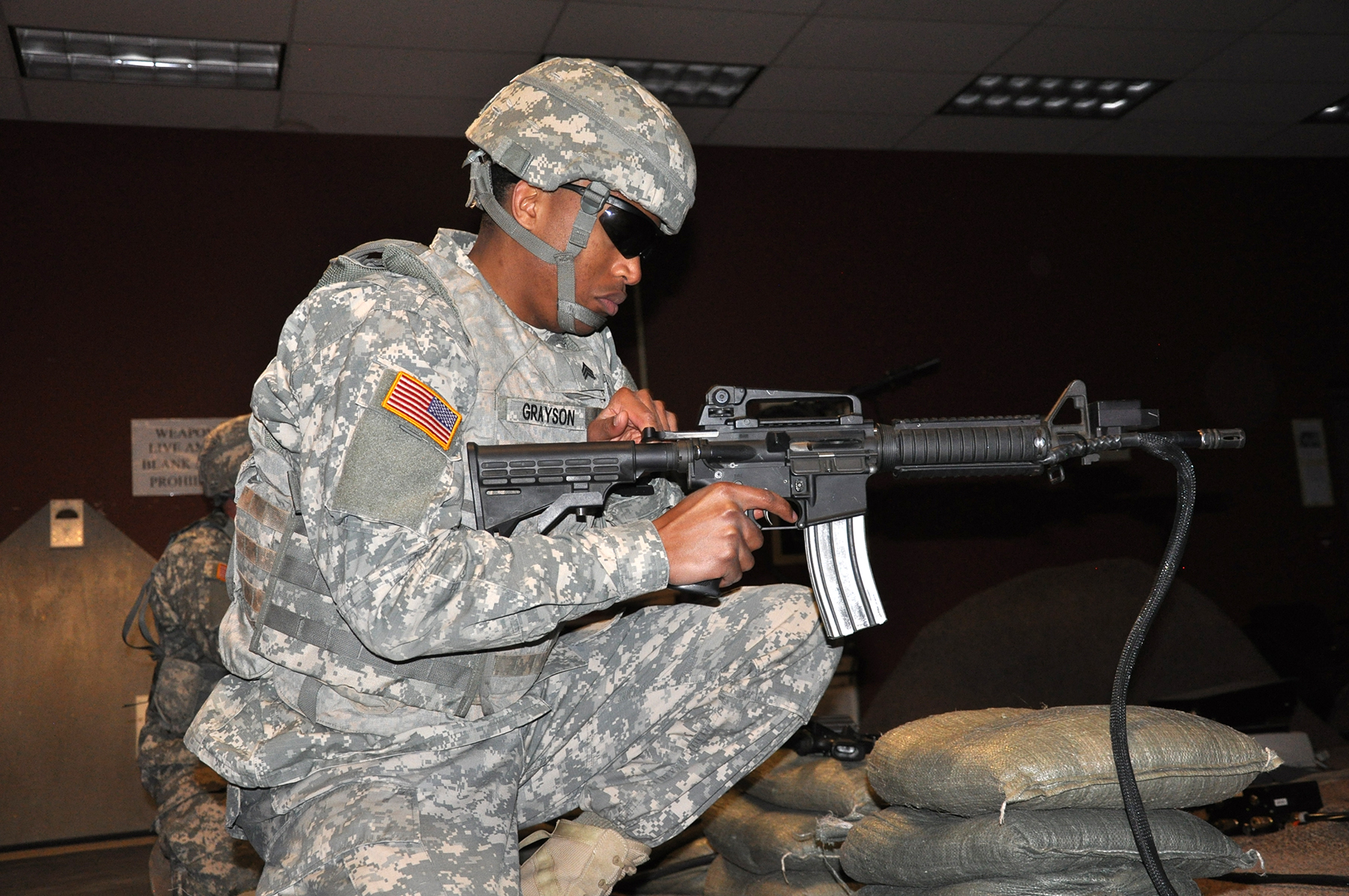 a soldier with a gun in his hand