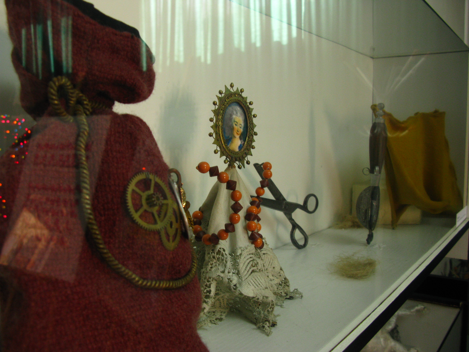 a collection of decorative objects are on display