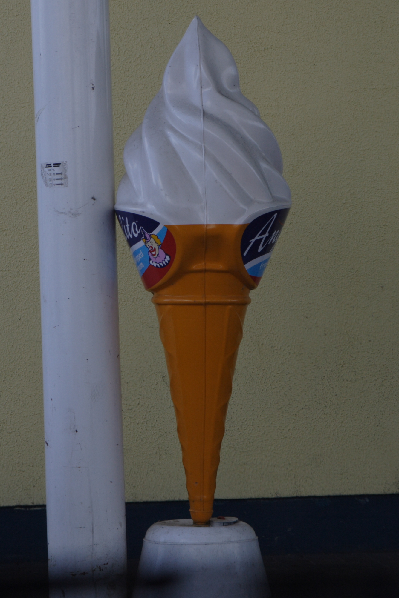 a giant ice cream cone covered with frosting