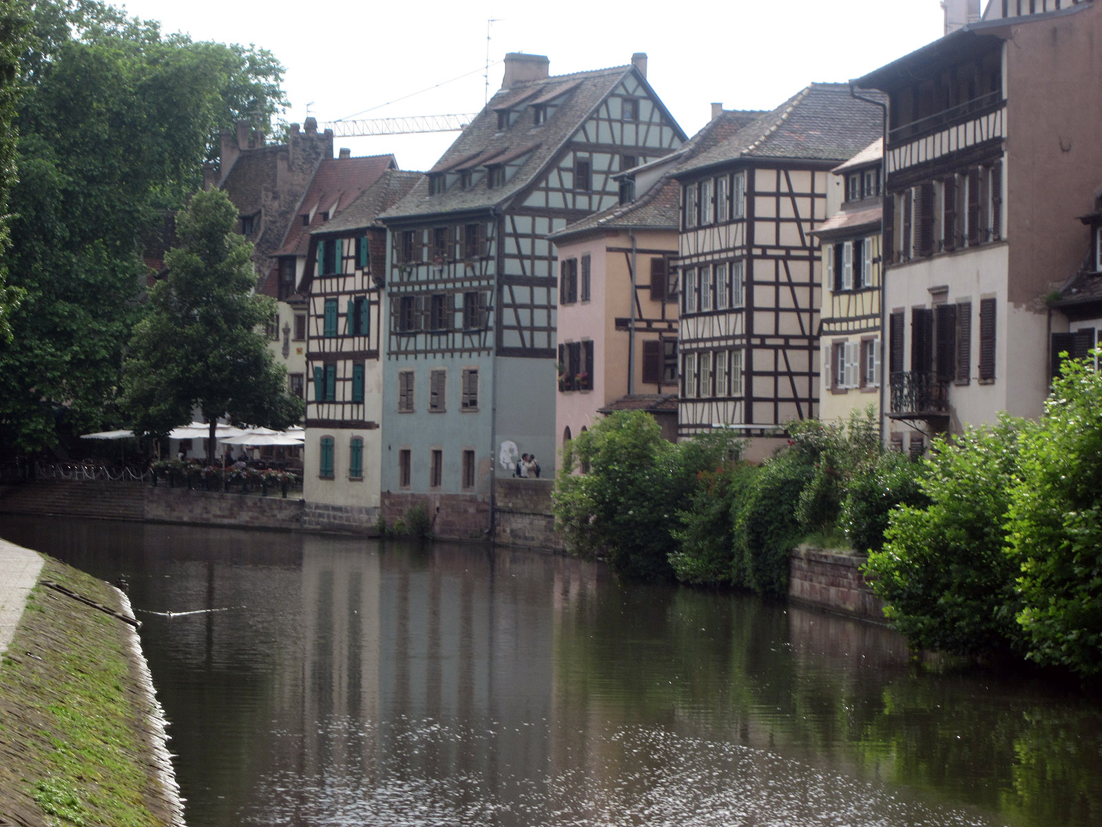 old houses along side a river in france