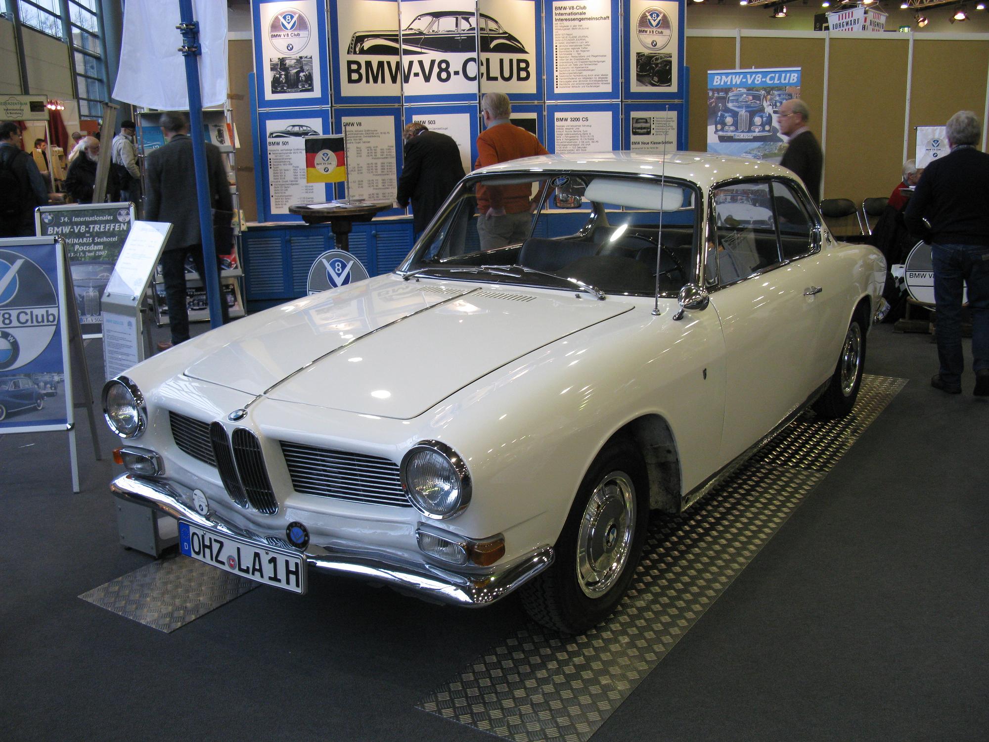 a classic car on display in a museum