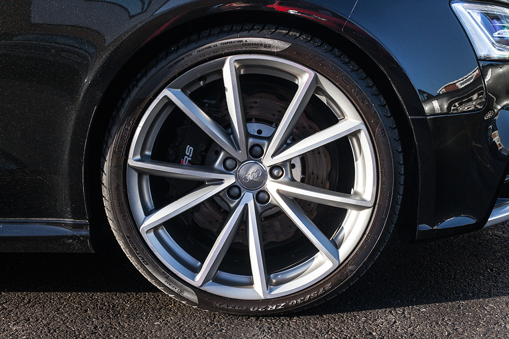 the wheel on the car is clean and shiny