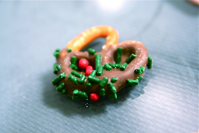 a sprinkled pretzel and doughnut ring