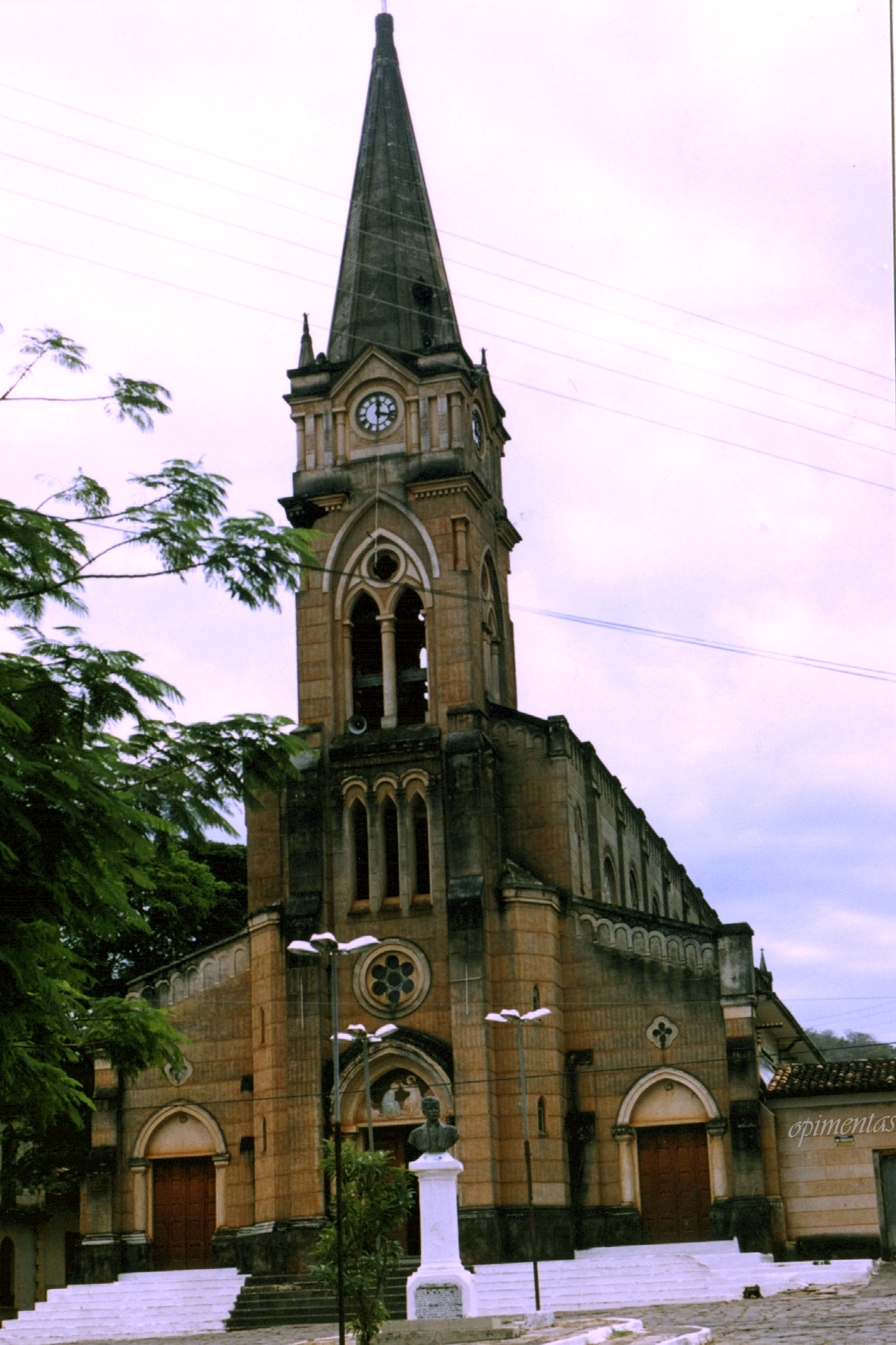 an old church with a large clock tower