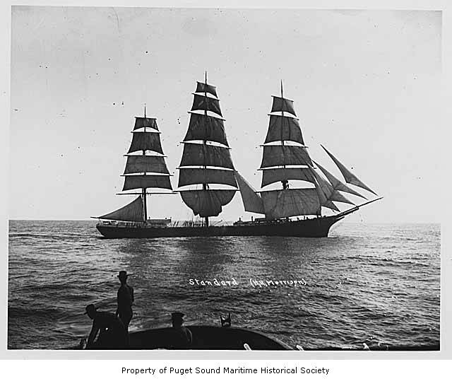 an old pograph of two tall sailing boats