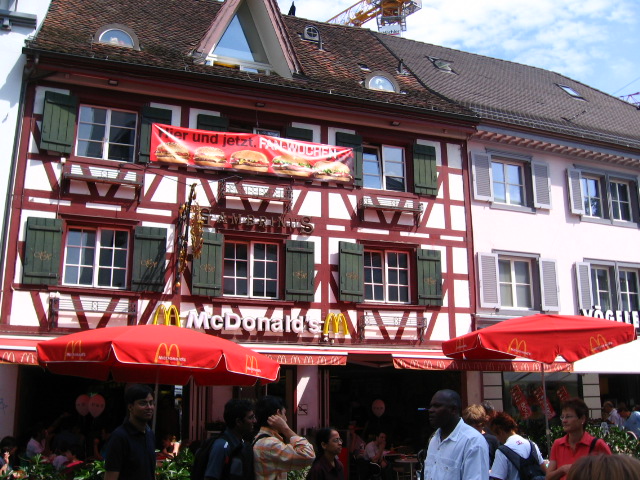 a restaurant in a german town that is red and white