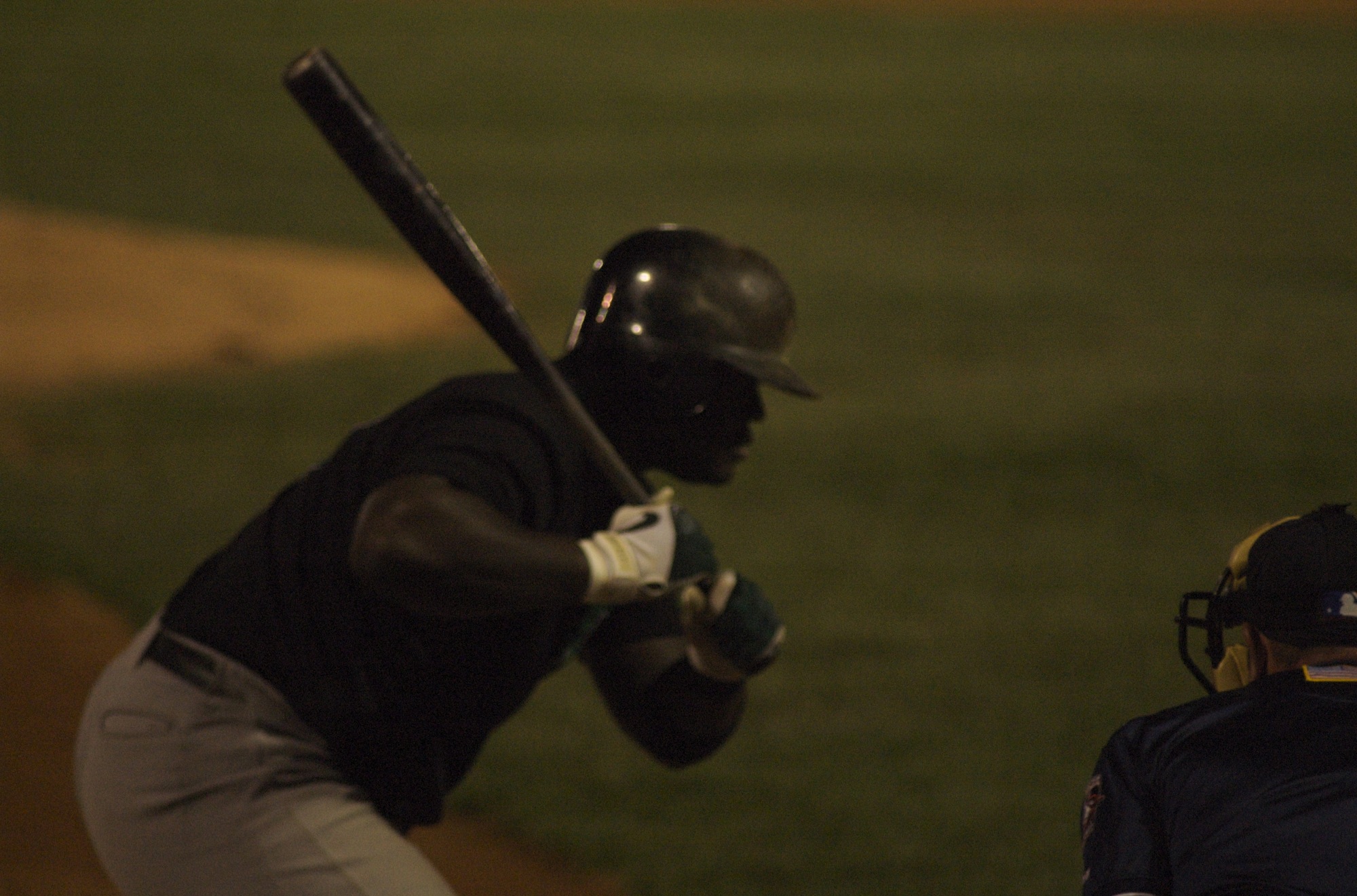 a batter waits for the pitch to be thrown