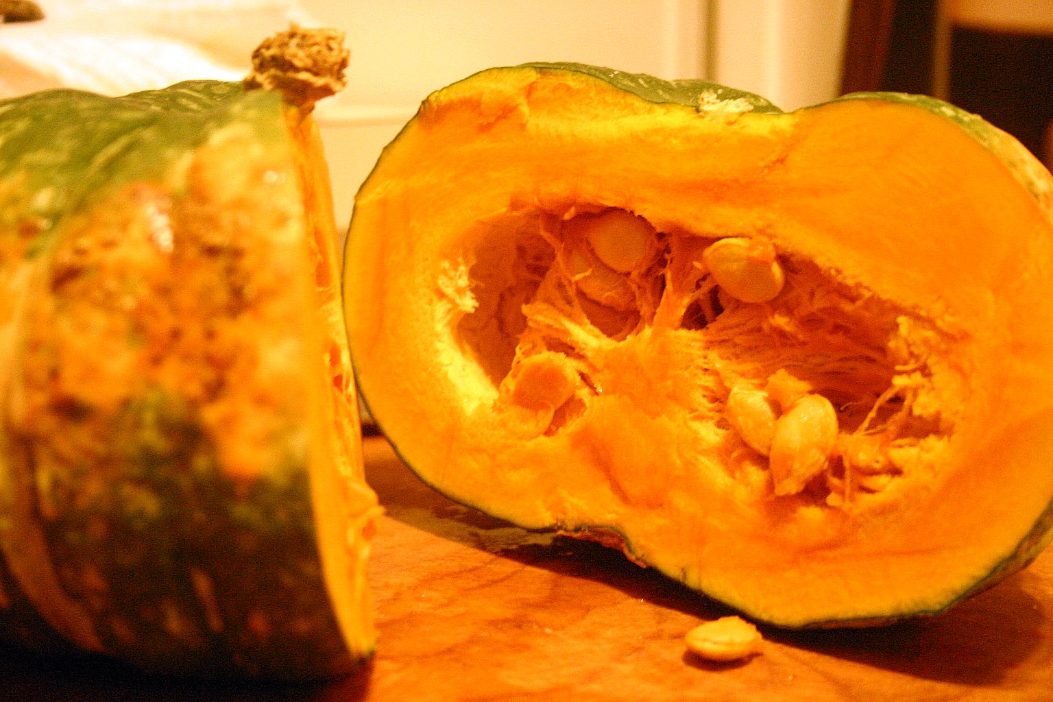 a pumpkin with the top half cut open