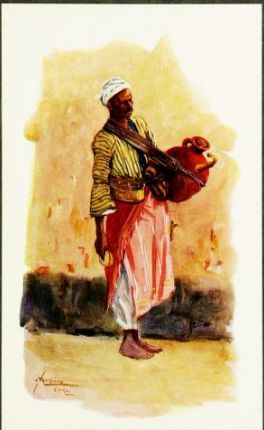 the artist is carrying a large bag on his head