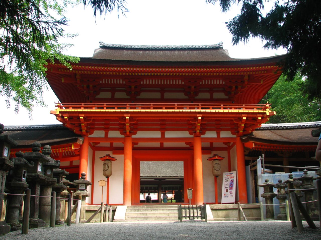 a pagoda in an asian country setting that has a walkway to it