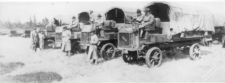 a number of people in wagons with tents