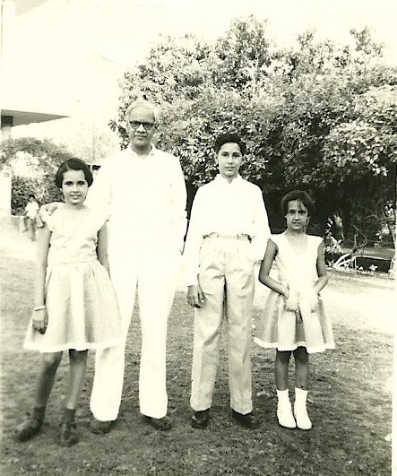 an old black and white po of three women and two children