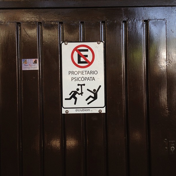 sign on door telling people not to fall from the sky