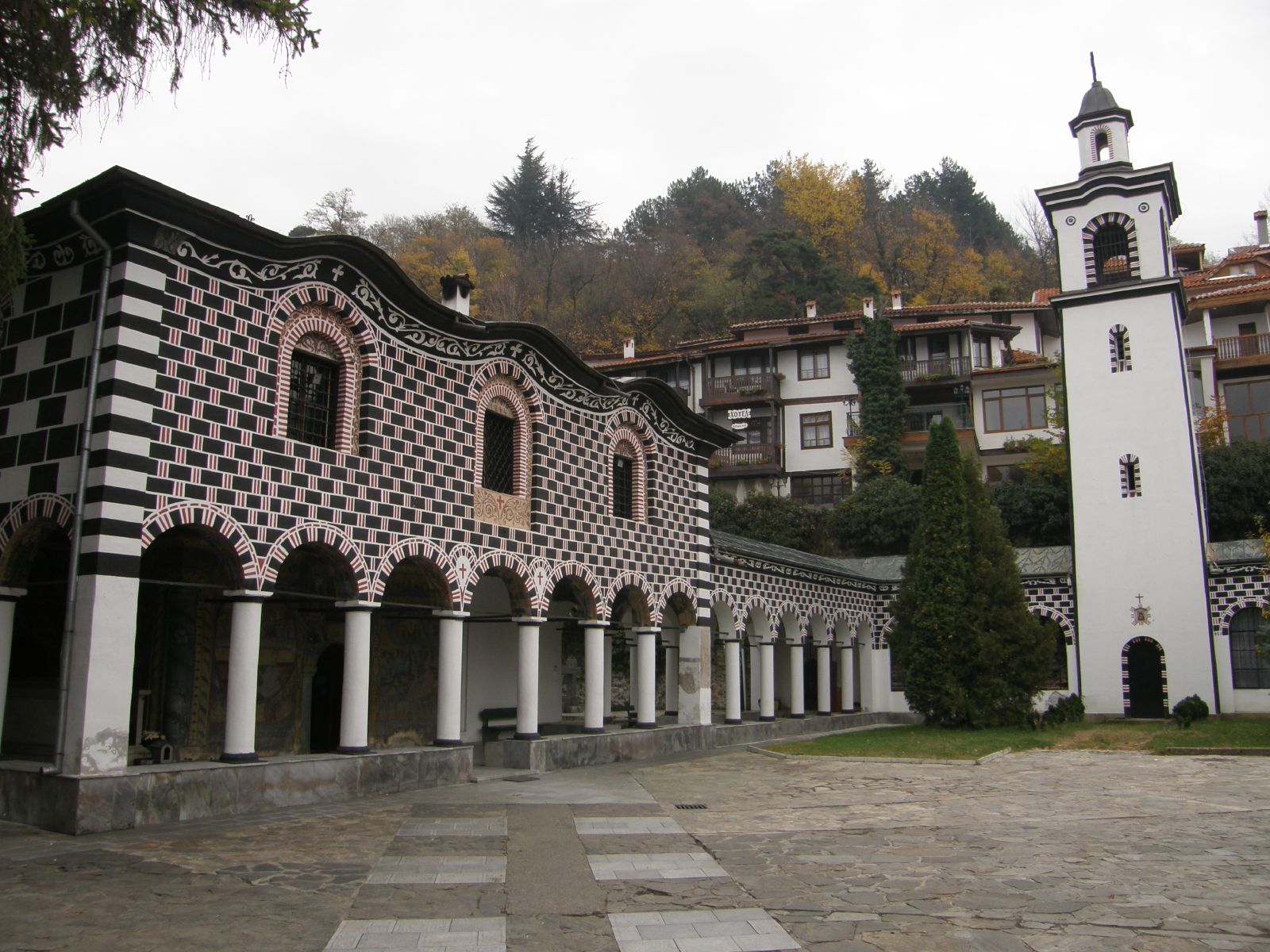 an ornately decorated building on a street in a rural town