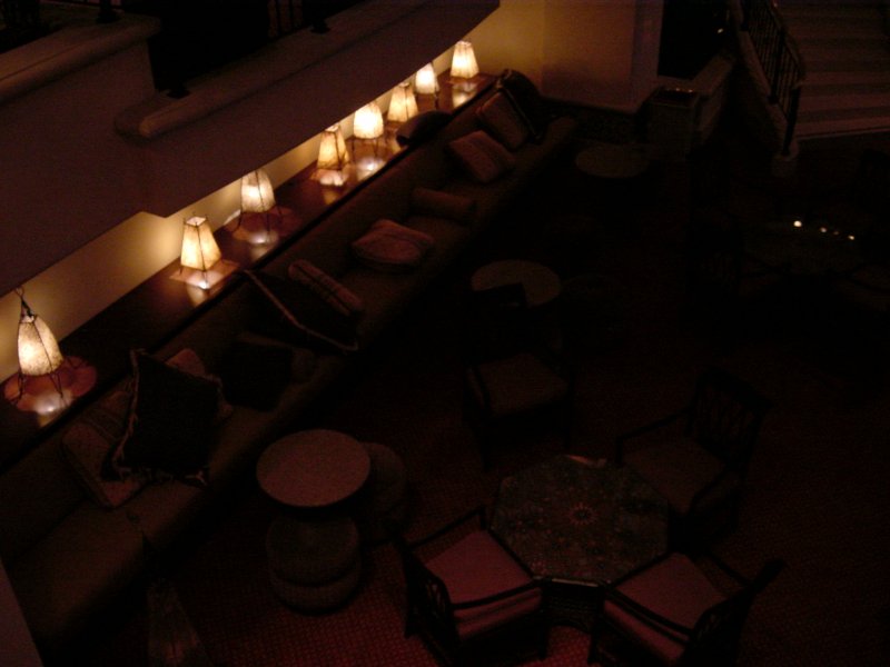 the tables are all lit up on the floor in the dark